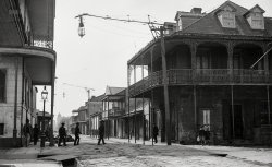 1890s. "The French Quarter, New Orleans." Its carbon arc lamps lighting the way to an electrified future. Glass negative by William Henry Jackson. View full size.