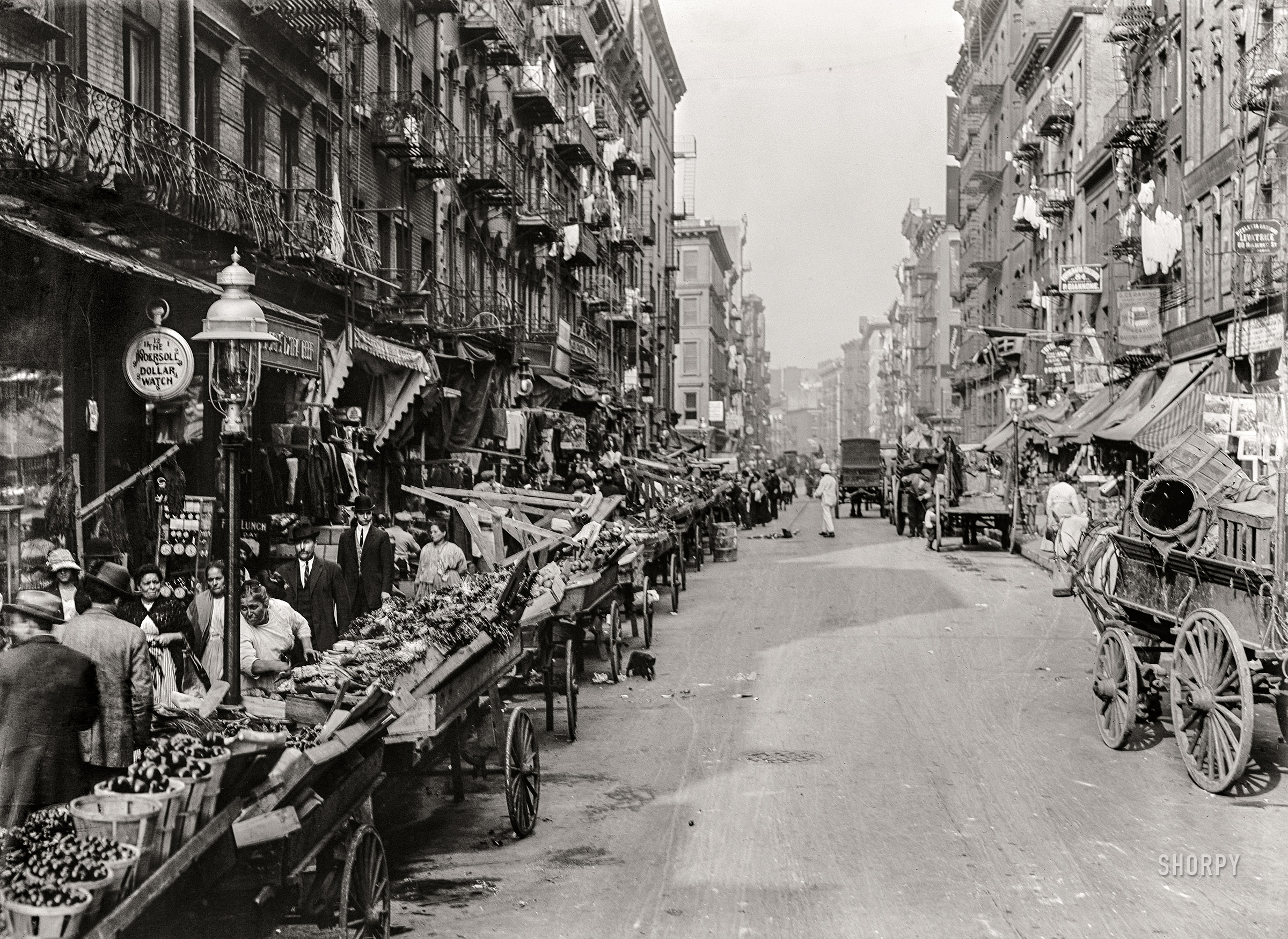 Circa 1905. "Italian neighborhood with street market -- Mulberry Street, New York." 5x7 inch dry plate glass negative, Detroit Publishing Company. View full size.