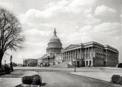 Circa 1905. "The Capitol at Washington -- East Front." The Senate wing is closest to the camera, with Thomas Crawford's sculpture The Progress of Civilization decorating the pediment atop the portico; the House of Representatives pediment at far left is blank; it would eventually be filled by Paul Bartlett's sculpture Apotheosis of Democracy, dedicated in 1916. 8x10 glass negative. View full size.
Those steps will always remember themYears ago my wife and I visited DC. Sat down on those steps to take a breather. Got up took off and wife left her purse on the those steps.
Amazingly enough. When she discovered her mistake roughly 20 minutes later we hustled back. Bag was still there same spot untouched. Before Paranoid days began.
As seen on money...That perspective of the capitol has drawn artists and photographers for generations. Here it is on a $2 bill of the Series of 1917. Despite the date appearing on it, the note was printed sometime 1923-27, as determined by the concurrent terms of the two signers.
(The Gallery, D.C., DPC)
