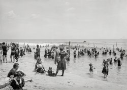 Circa 1910. "Surf bathers at beach, possibly Atlantic City." Bathing-stockings optional! 8x10 inch glass negative, Detroit Publishing Company. View full size.