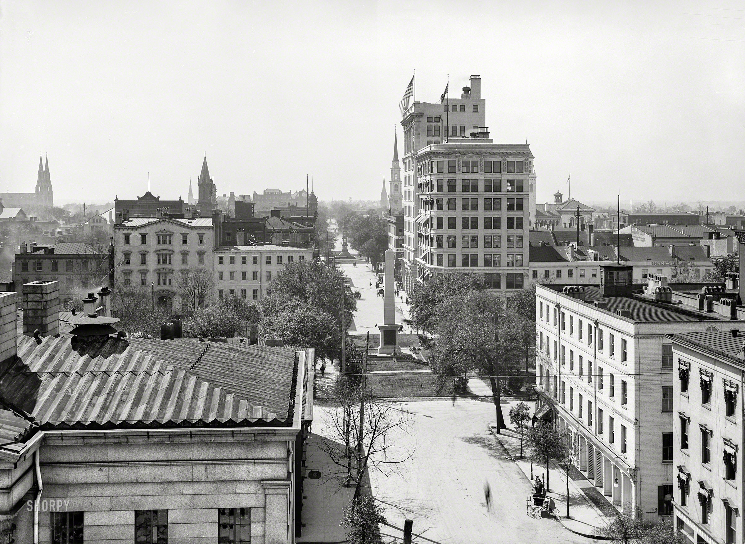Savannah, Georgia, circa 1906. "Bull Street and Johnson Square -- National Bank of Savannah." With a supporting role played by the Pulaski House Tonsorial Parlor. 5x7 inch dry plate glass negative, Detroit Publishing Company. View full size.