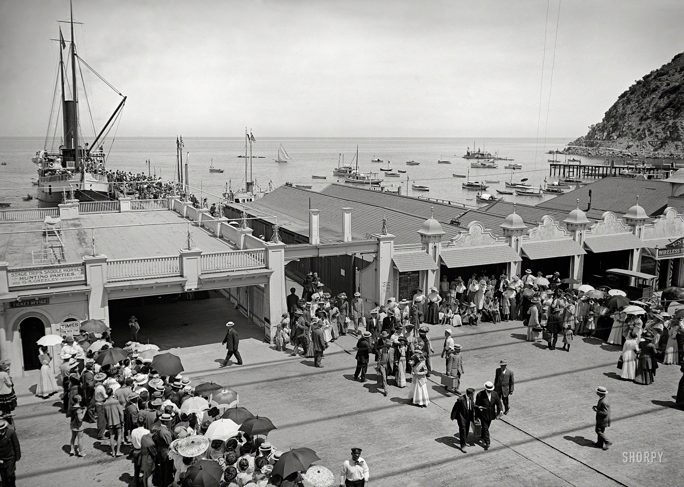 August 1915. "Steamship ticket office at pier, Avalon, Catalina Island, California." 5x7 inch dry plate glass negative, Detroit Publishing Company. View full size.