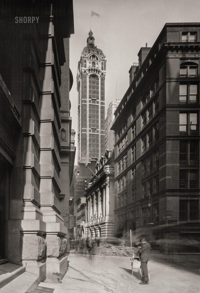 New York, 1910. "Singer Tower from Liberty and Nassau streets." At 612 feet, the Singer Building, headquarters of the famous sewing machine manufacturer, was the world's tallest from 1908 to 1909, when it was surpassed by the Metropolitan Life tower.  11x14 inch dry plate glass negative, Detroit Publishing Company. View full size.