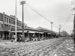 New Orleans circa 1900. "The French Market, Decatur and Peters Streets." 8x10 inch dry plate glass negative, Detroit Photographic Company. View full size.