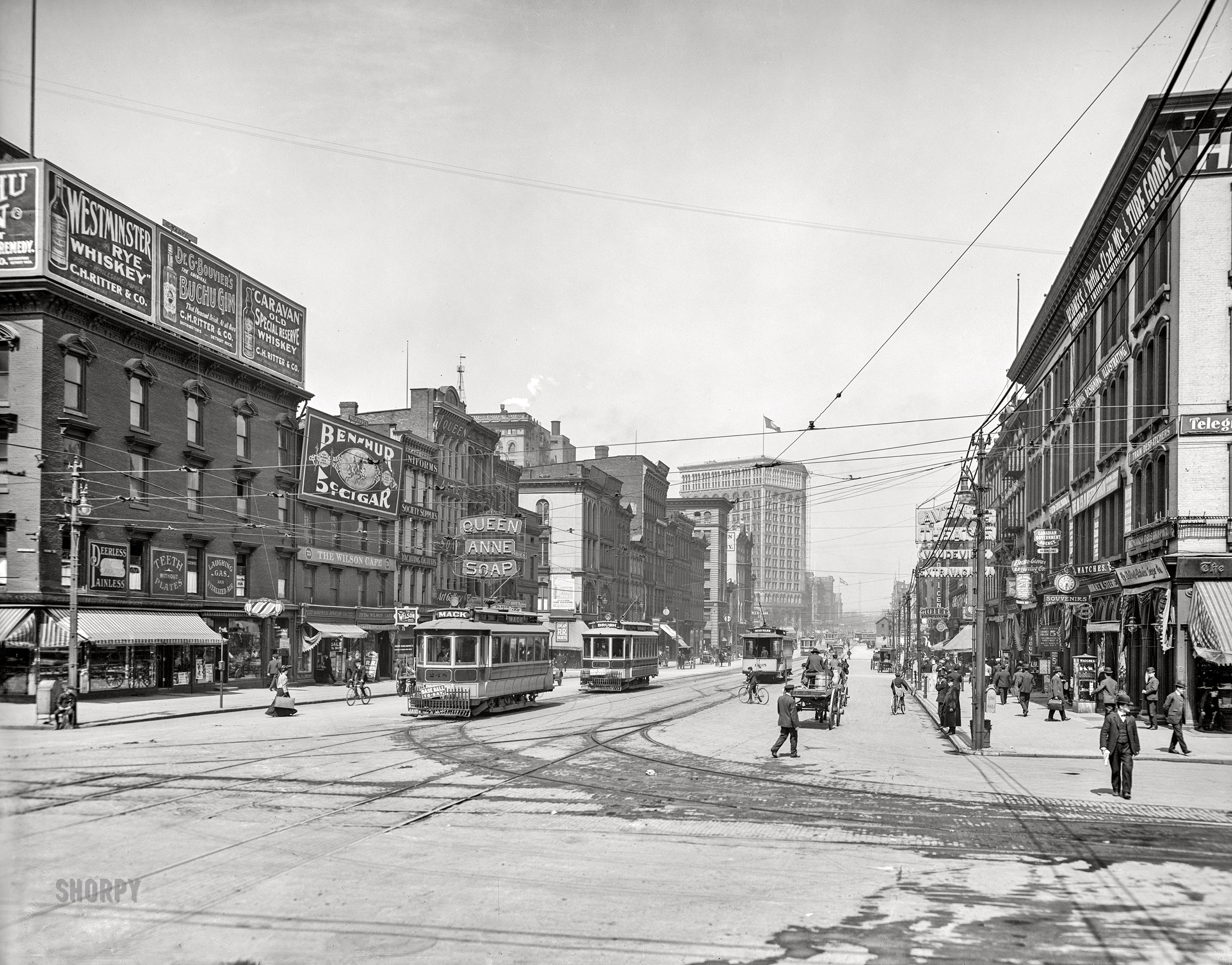 Detroit circa 1905. "Woodward Avenue north from Jefferson." A phantasmagoria of signage advertising vaudeville, soap, cigars and the mandatory Painless Dental Parlors (your choice of Laughing Gas or "Vitalized Air"). 8x10 inch glass negative, Detroit Publishing Co. View full size.
