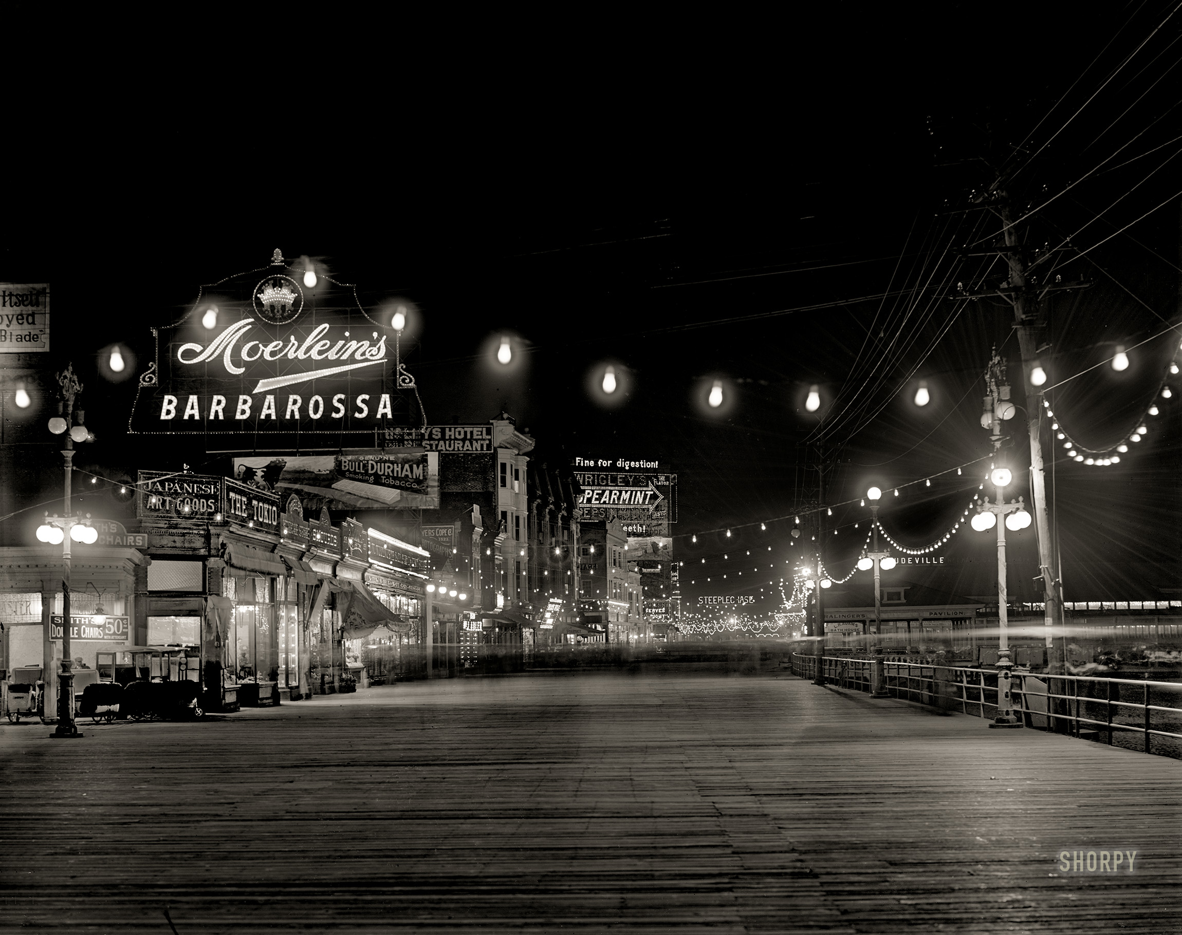 Atlantic City, New Jersey, circa 1910. "The Boardwalk at night." 8x10 inch dry plate glass negative, Detroit Publishing Company. View full size.