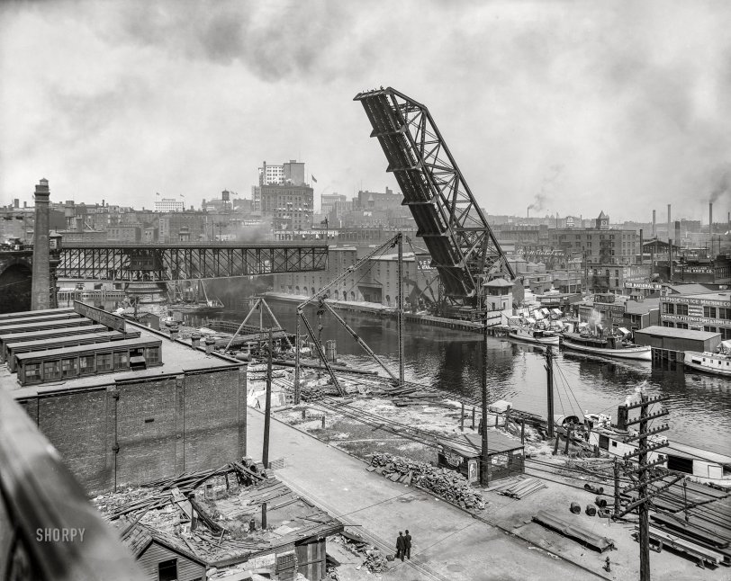 Cleveland circa 1910. "Lift Bridge (raised) and Superior Avenue Viaduct (swing bridge at left), Cuyahoga River." 8x10 inch glass negative, Detroit Publishing Company. View full size.
