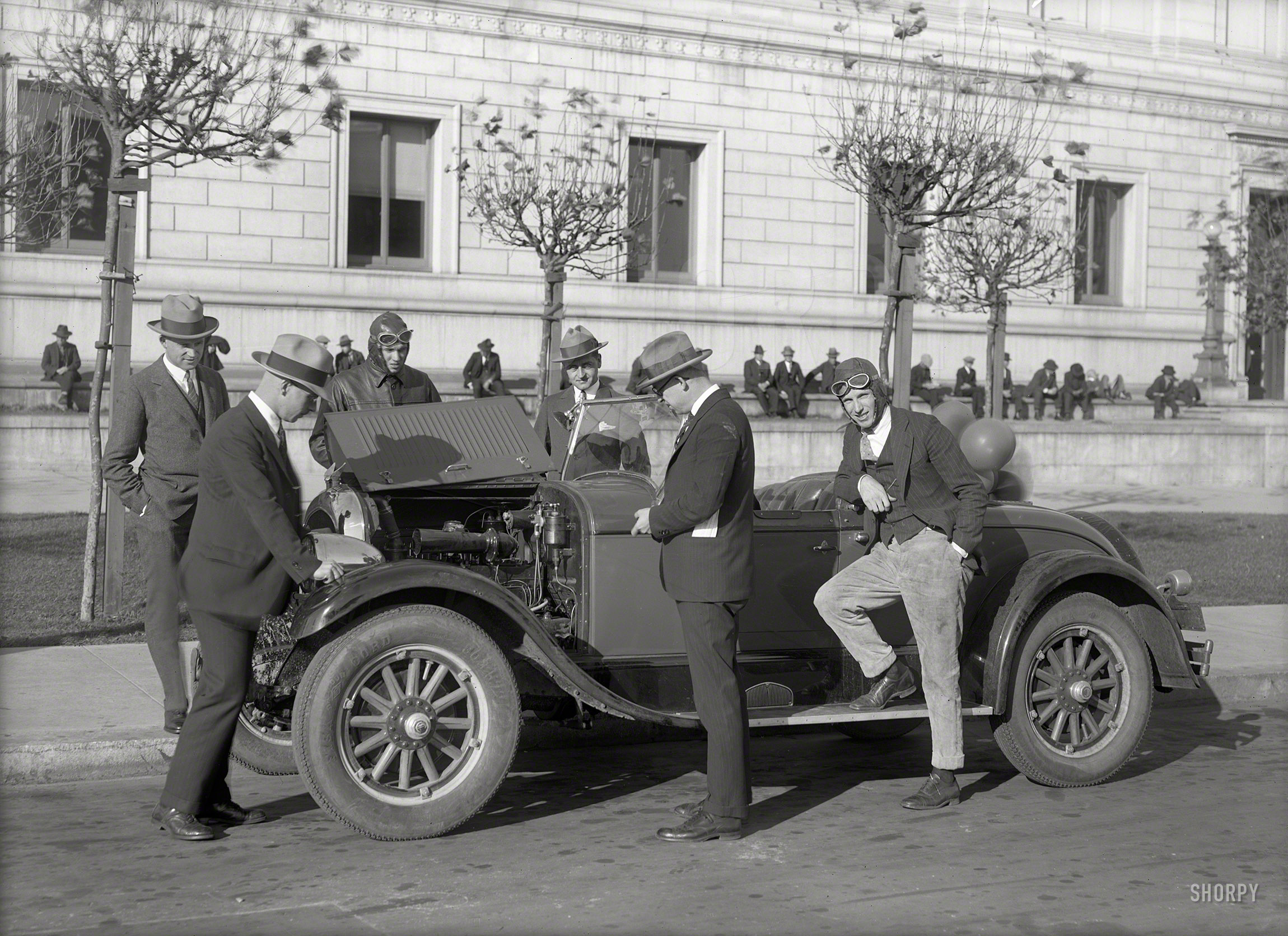 Circa 1927. "Chrysler roadster at San Francisco Public Library with racing drivers." And festive balloons! 5x7 glass negative by Christopher Helin. View full size.