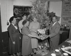 From Columbus, Georgia, comes this circa 1953 image of what seems to be a Christmas party at a laundry. Be of good CHEER, and a happy yule TIDE to ALL! 4x5 acetate negative from the News Archive. View full size.
