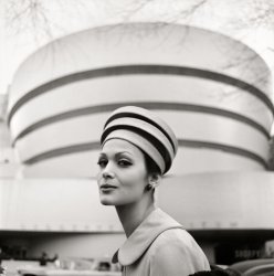January 1960. "Fashion model in front of Guggenheim Museum, New York, wearing hat that resembles the museum, designed by Frank Lloyd Wright." Acetate negative by Tony Vaccaro for the Look magazine assignment "For Women Only: Architectural Hats." View full size.
