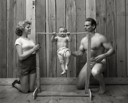 June 1947. "Bodybuilder Gene Jantzen with wife Pat and 11-month-old son Kent." Photo by Stanley Kubrick for the Look magazine assignment "Strong Man's Family." Look Photograph Collection, Library of Congress. View full size.