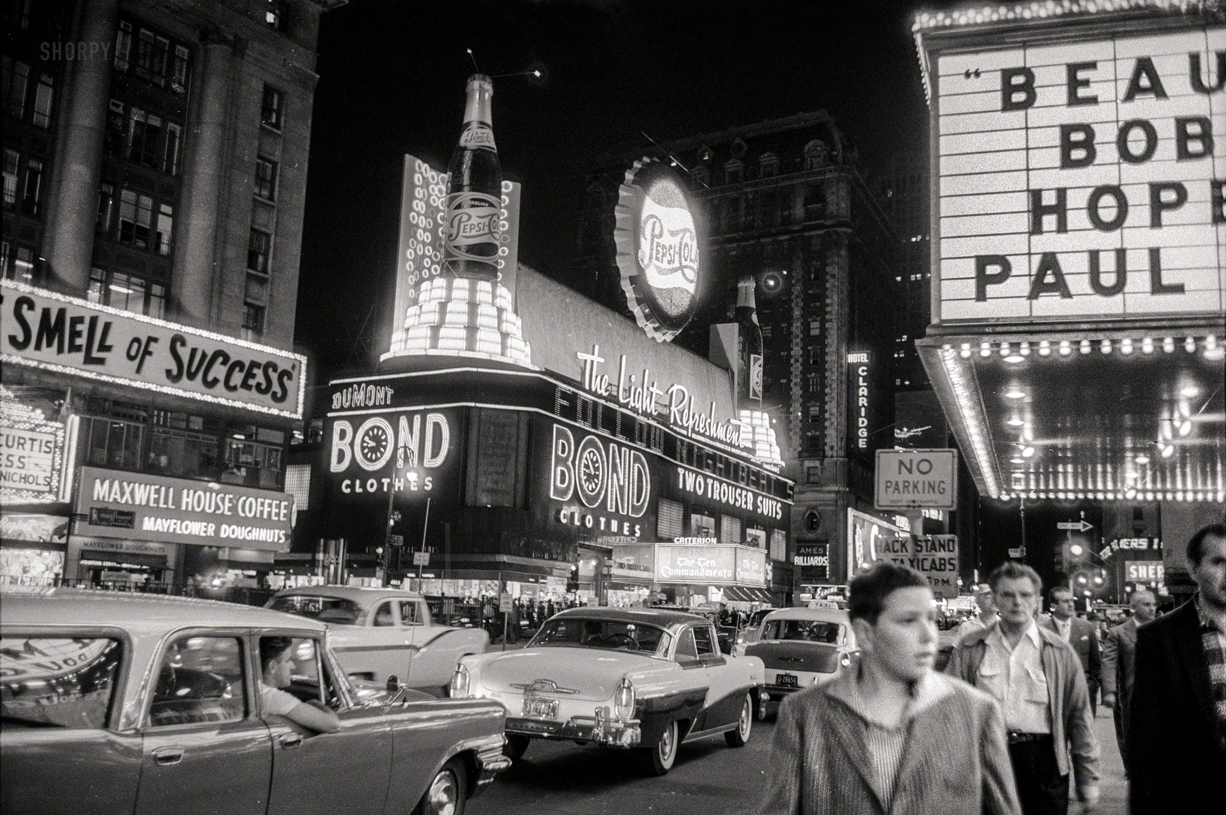 New York, 1957. "Broadway Theatre District -- Times Square at night." Now playing at Loew's State: "The Sweet Smell of Success." 35mm negative from the Look magazine photo archive. View full size.