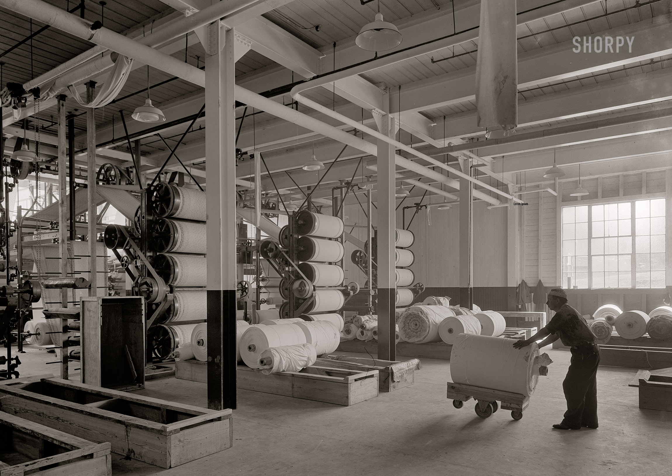 April 22, 1932. "Ware Shoals, South Carolina. Cotton cloth printing machine from rear." 5x7 inch acetate negative by Gottscho-Schleisner. View full size.