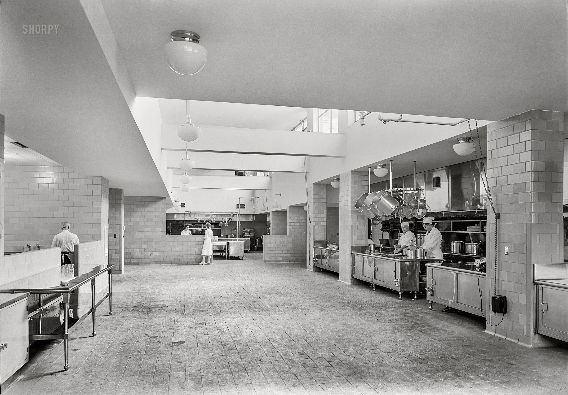 January 10, 1941. "Triboro Hospital for Tuberculosis, Parsons Boulevard, Jamaica, Queens, New York. Kitchen, long vista. Eggers & Higgins, architect." 5x7 inch acetate negative by Gottscho-Schleisner. View full size.