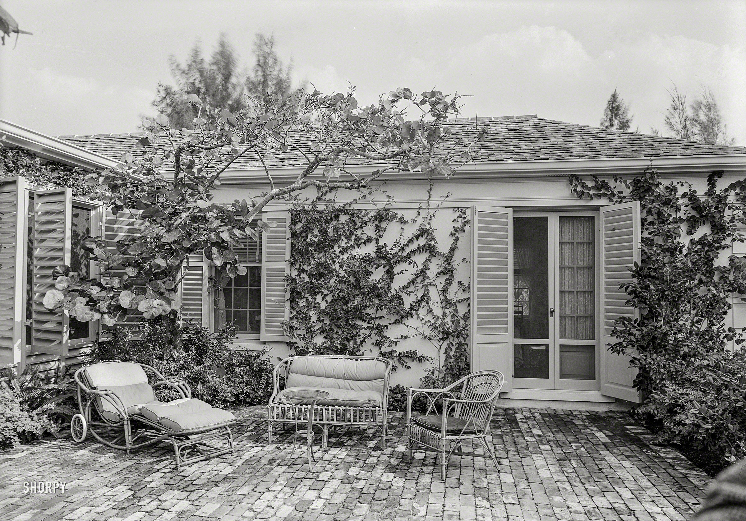 March 29, 1941. "James H. McGraw Jr. residence in Hobe Sound, Florida. Patio. Henry Corse, architect." Gottscho-Schleisner photo. View full size.