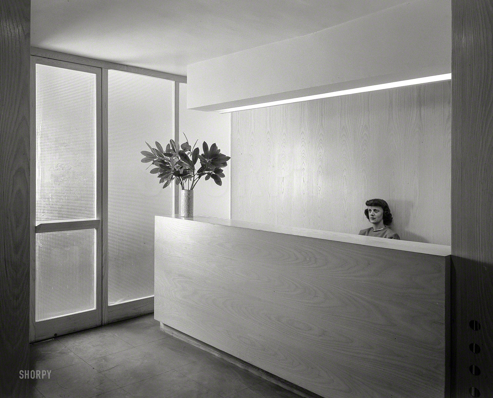 Oct. 27, 1948. "Russel Wright, 221 E. 48th St., New York City. Office with secretary." Large-format negative by Gottscho-Schleisner. View full size.