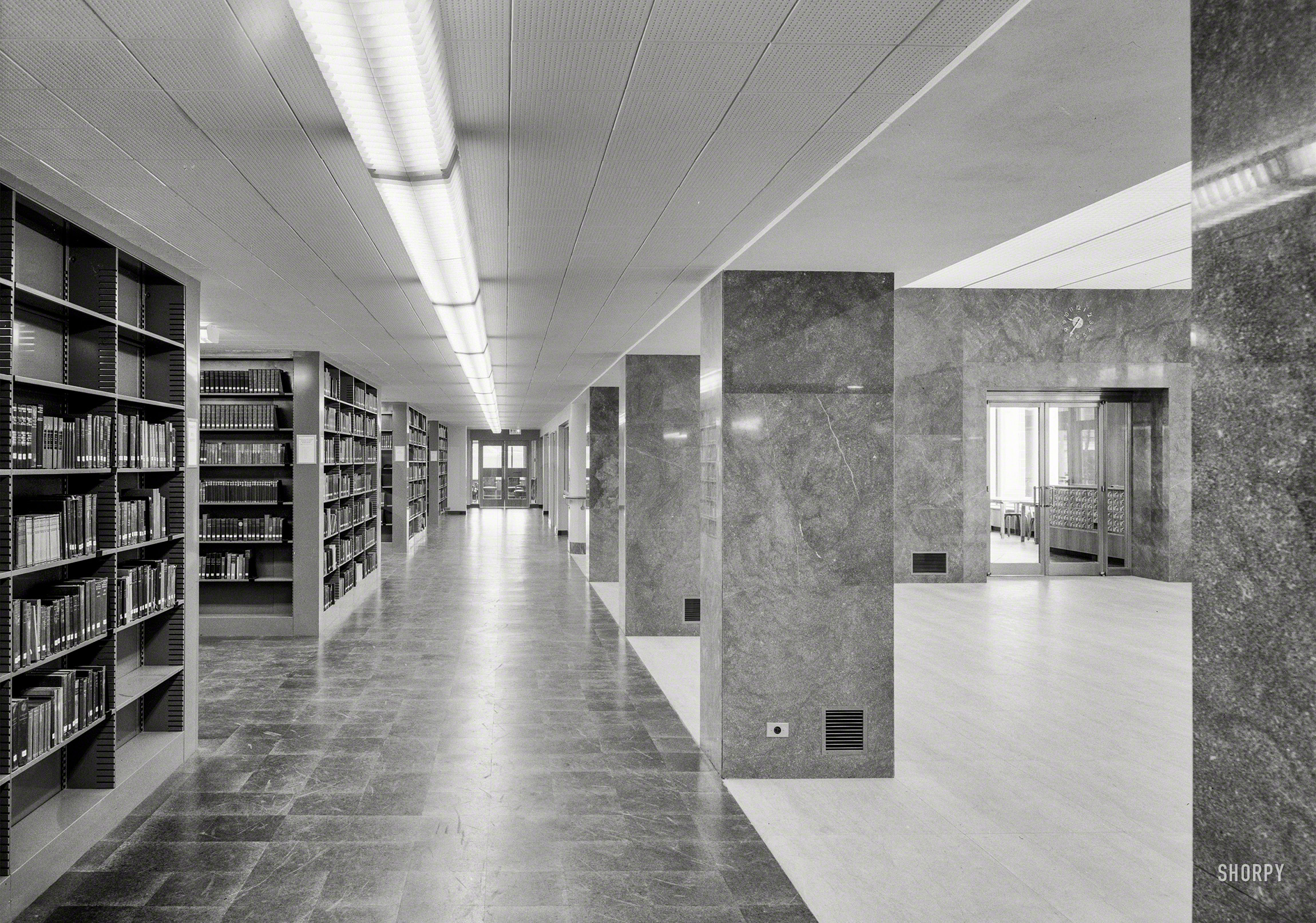 Feb. 19, 1949. "Lamont Library, Harvard University, Cambridge, Massachusetts. Long view, main corridor, third level." Gottscho-Schleisner photo. View full size.