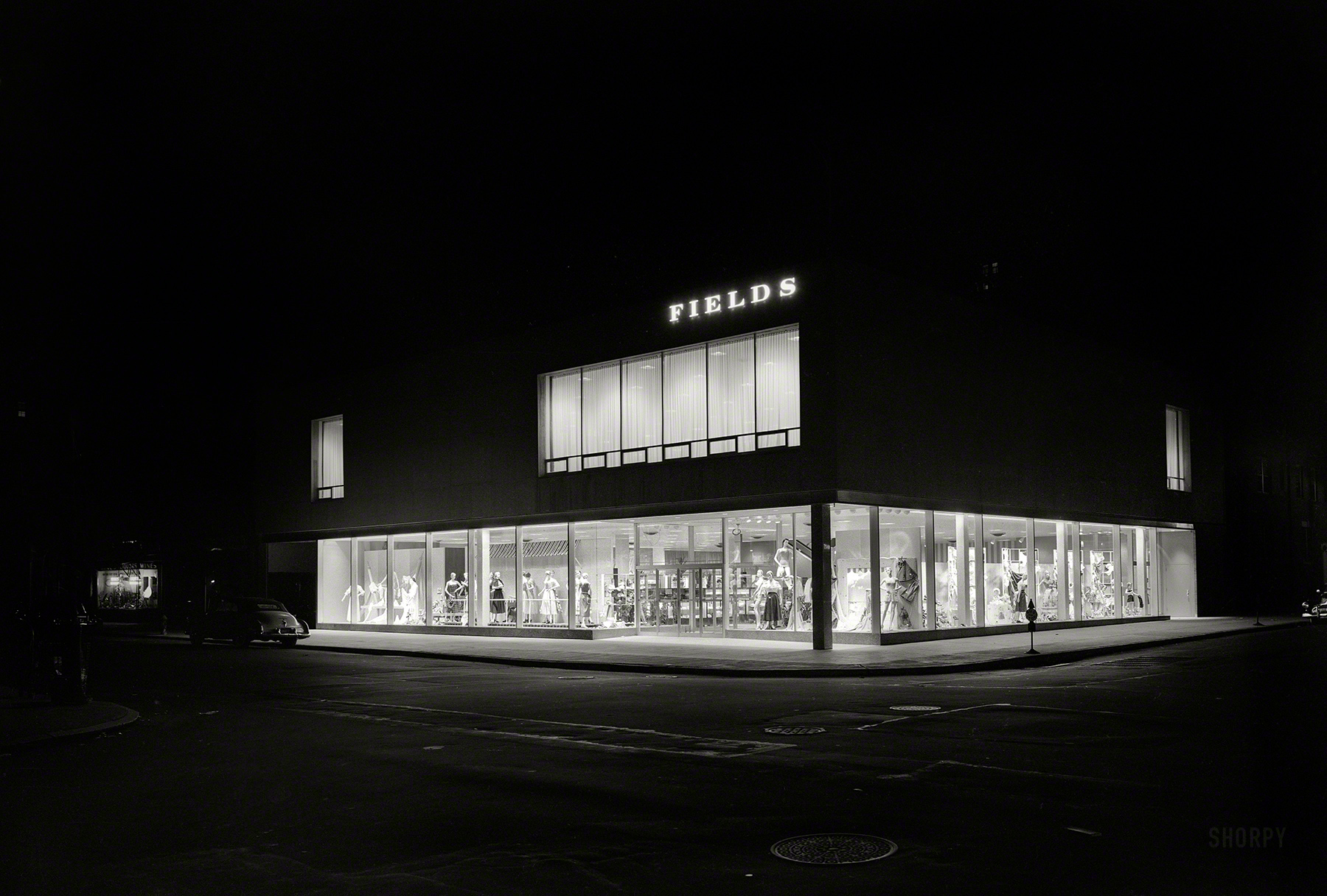 June 8, 1950. "Fields department store, business at 37th Avenue and 82nd Street, Jackson Heights, Queens, New York. Exterior, by night." (Daytime view here.) 5x7 inch acetate negative by Gottscho-Schleisner. View full size.