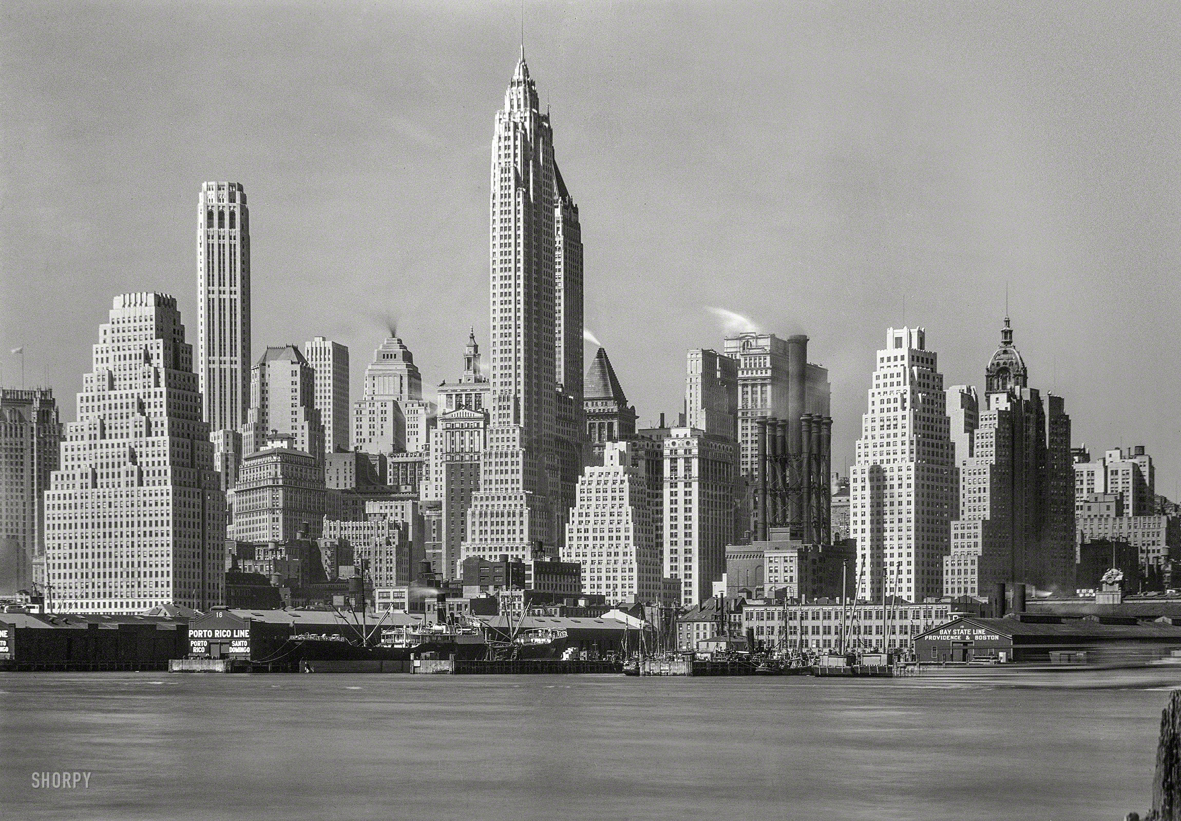 April 4, 1932. "New York city views. Lower Manhattan from foot of Brooklyn Bridge." Large-format acetate negative by Gottscho-Schleisner. View full size.