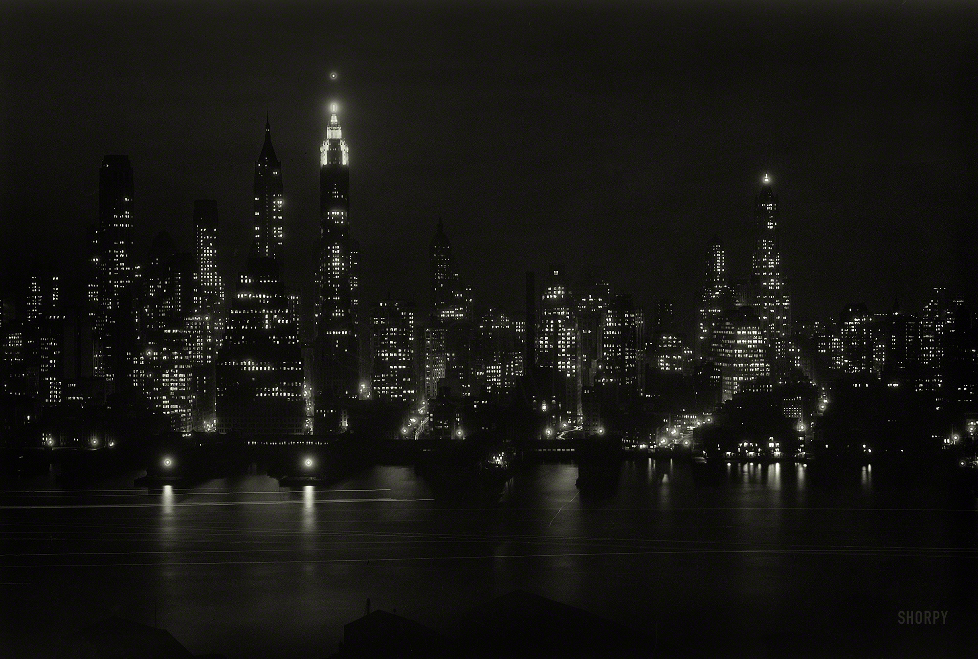 January 6, 1933. "Manhattan from St. George Hotel in Brooklyn to financial district, night view." 5x7 acetate negative by Gottscho-Schleisner. View full size.