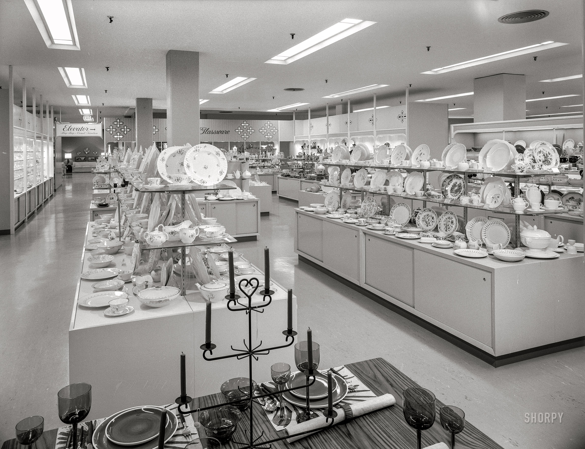 October 23, 1959. "Bloomingdale's, Hackensack, New Jersey. China and glass department. Raymond Loewy, client." Large-format acetate negative by Gottscho-Schleisner. View full size.