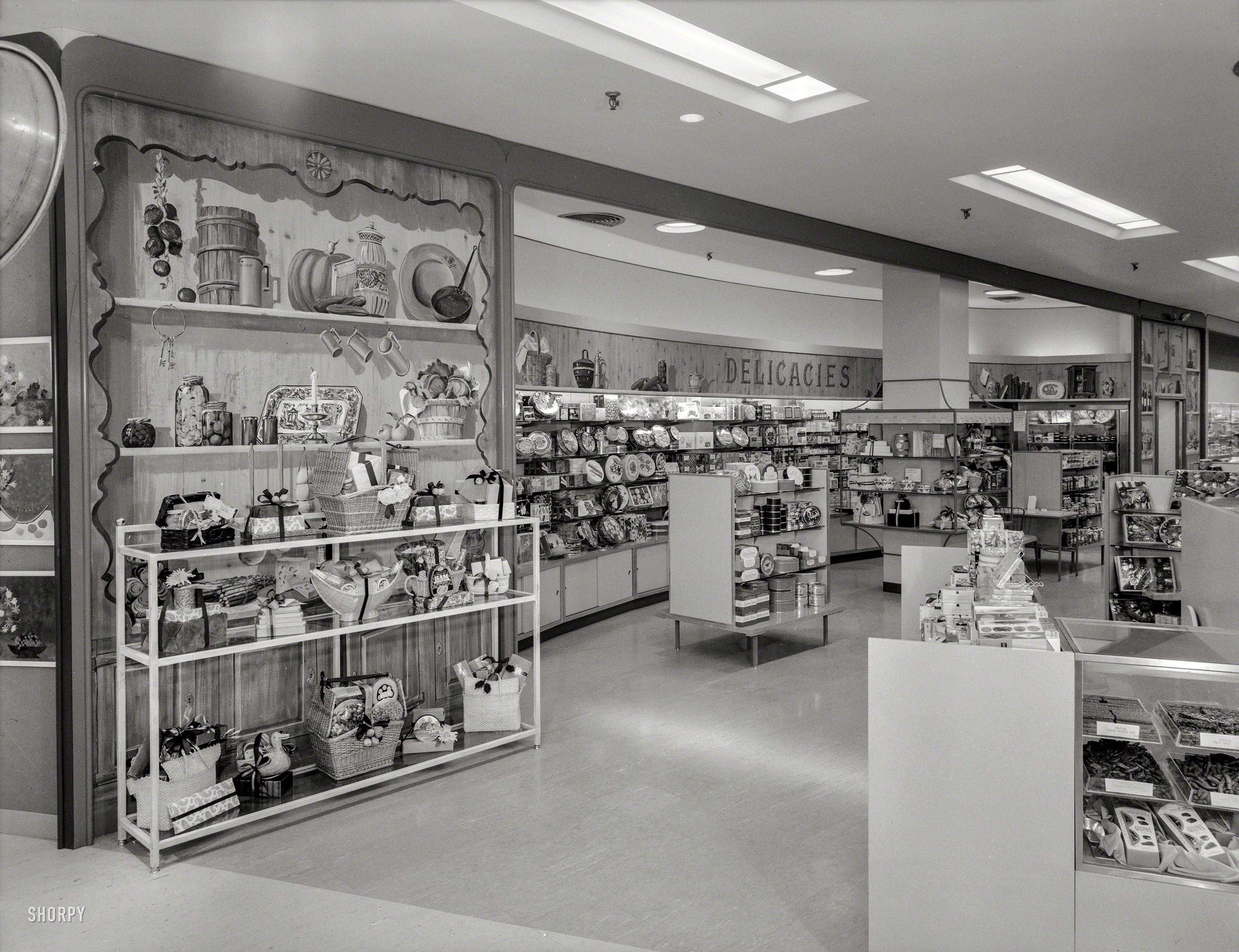 Oct. 23, 1959. Hackensack, New Jersey. "Bloomingdale's Bergen County. 'Delicacies.' Raymond Loewy Associates, client." Sweets for the upscale suburbanite. Large-format negative by Gottscho-Schleisner. View full size.