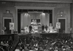 Prince George's County, Maryland, circa 1940. "Electric Institute of Washington. Cameo Theatre, Mount Rainier lecture." Reddy Kilowatt wants you to Just Say No to coal and gas. Safety negative by Theodor Horydczak.  View full size.