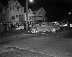 Oakland, California, circa 1958. "Car crash, night." Mercury vs. Buick in a well-attended bout. 4x5 acetate negative from the News Archive. View full size.