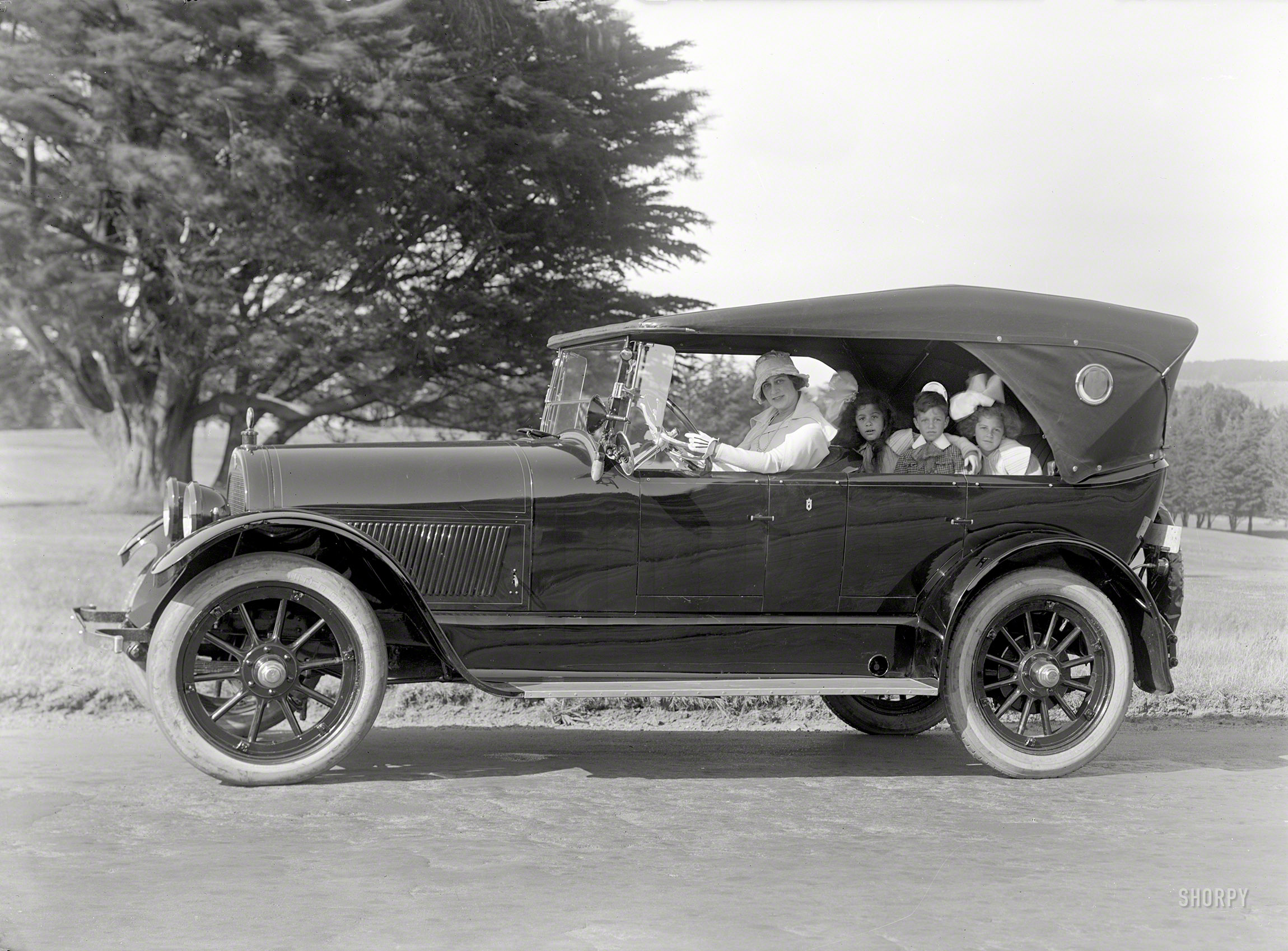 San Francisco circa 1922. "Haynes touring car." Even your wife can drive it, and it's safe enough for the kids. 5x7 glassneg by Christopher Helin. View full size.