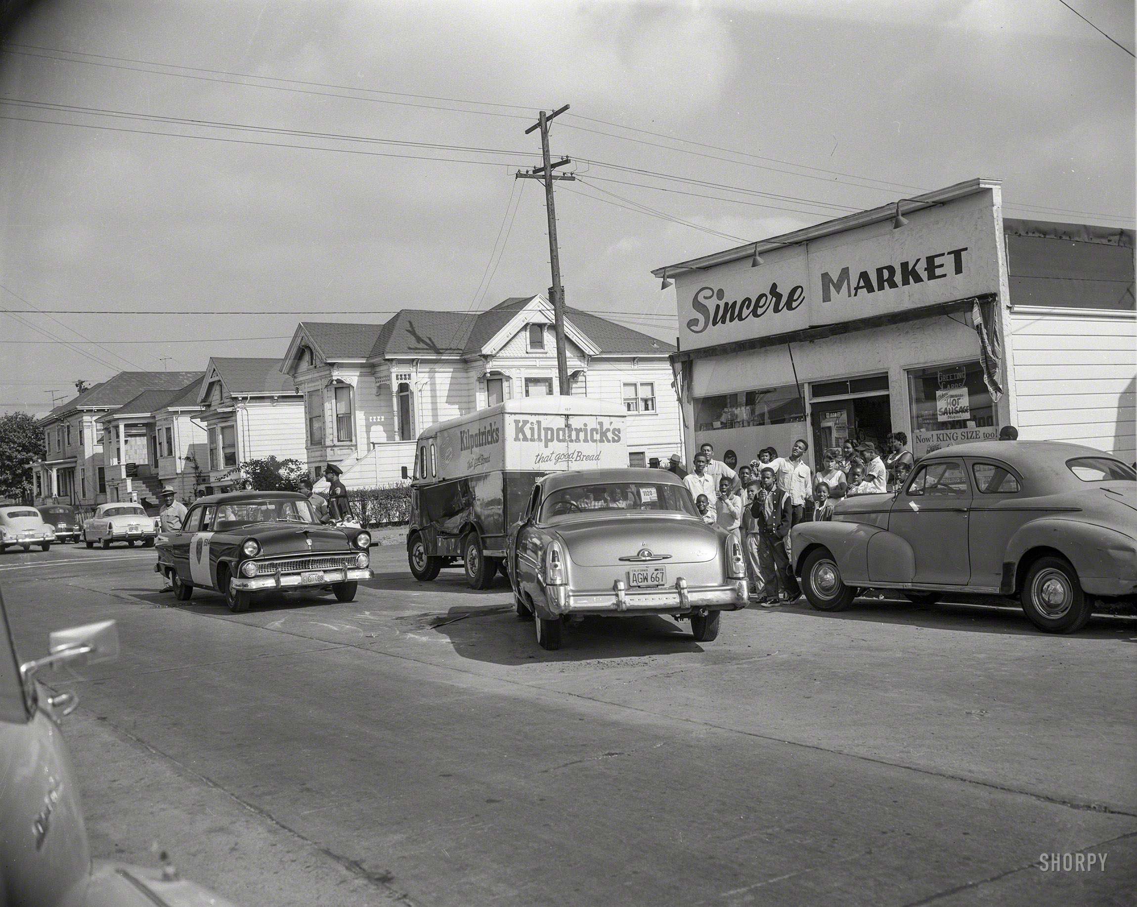 Oakland, Calif., circa 1958. "Bread truck collision." But so what. We need to make sure the Hot Sausage isn't hurt! 4x5 News Archive negative. View full size.