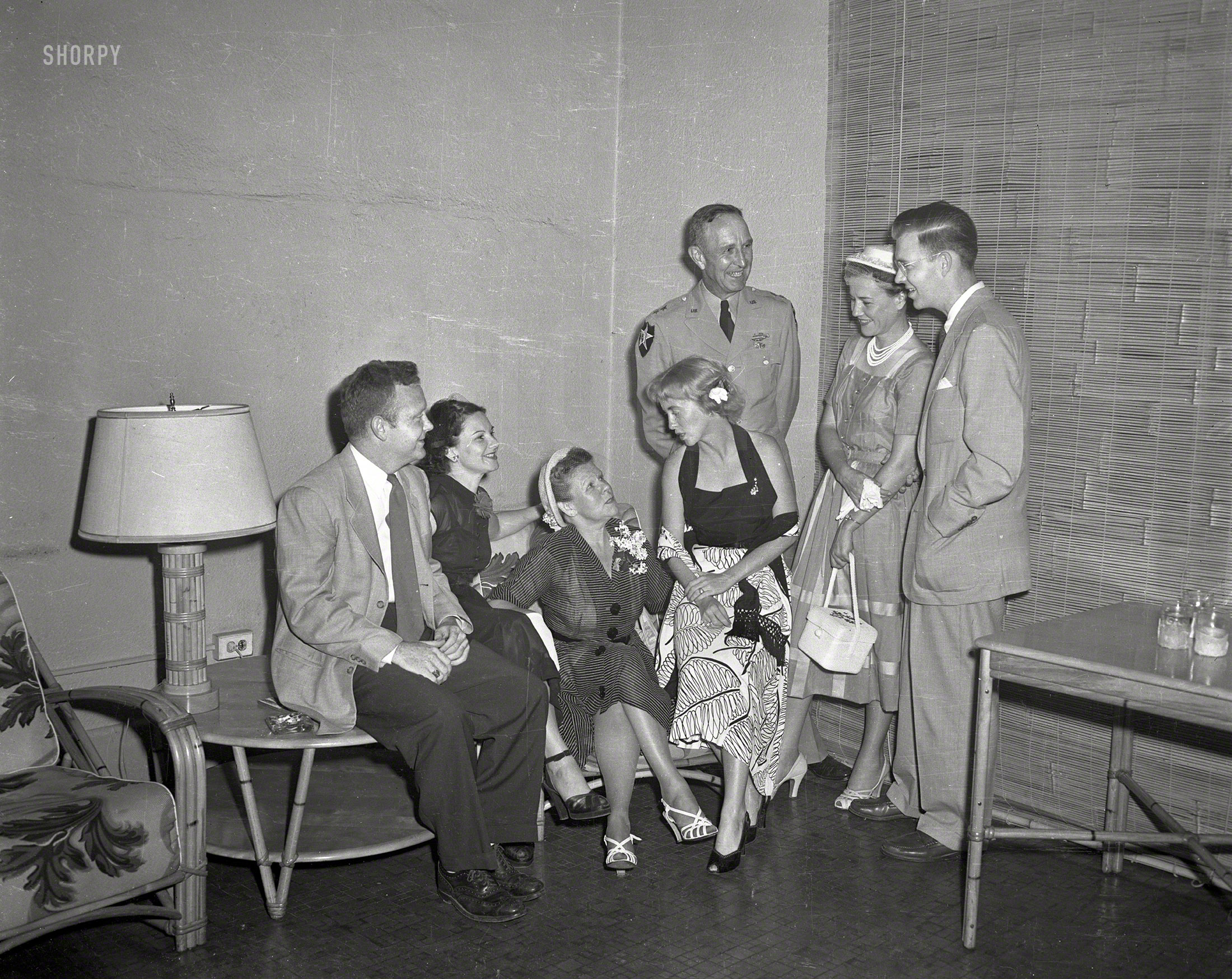 Columbus, Georgia, circa 1958. "Reception." Where civilian bamboo meets Army brass. 4x5 inch acetate negative from the News Photo Archive. View full size.