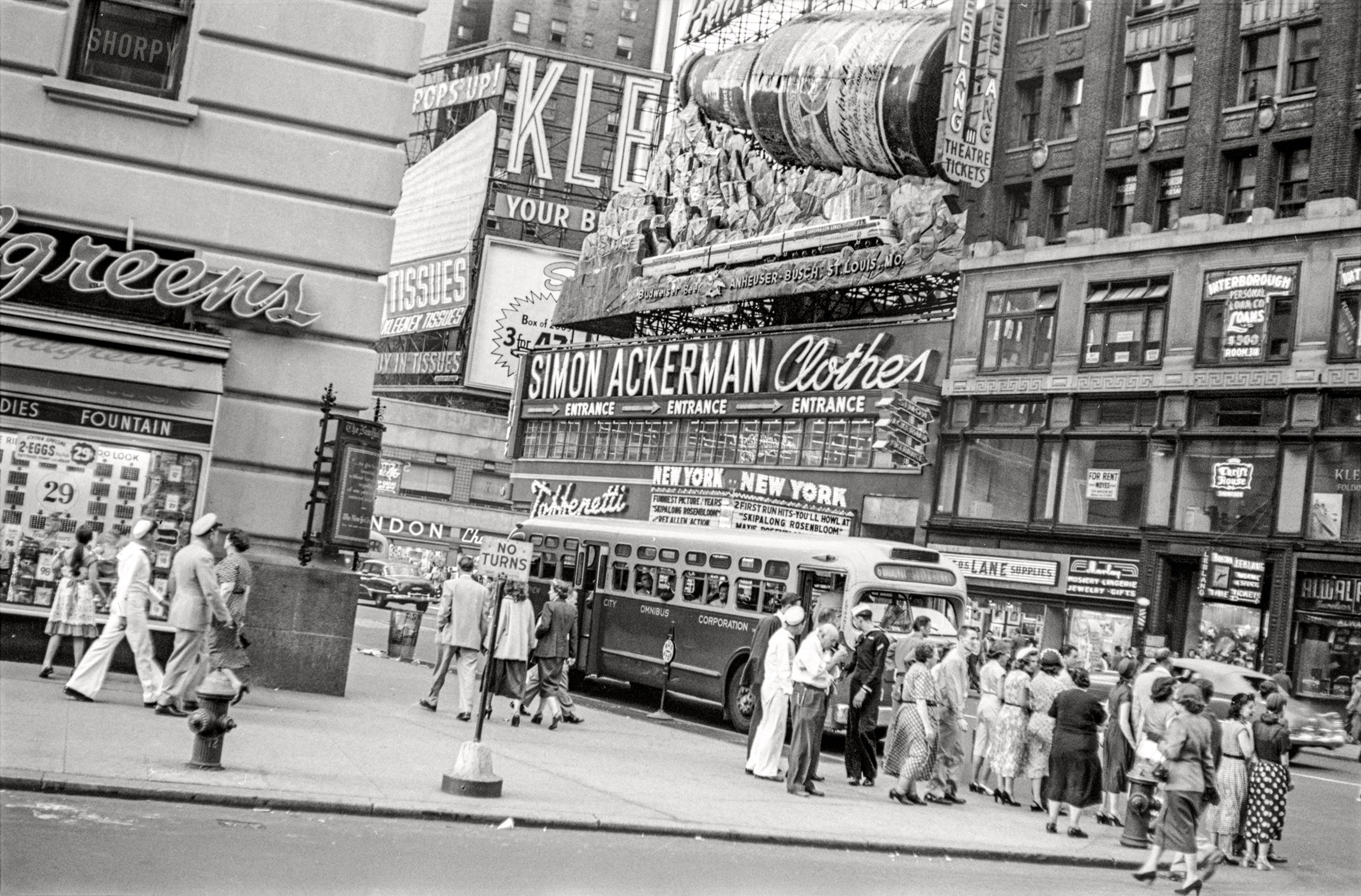 June 1951. "Times Square street scene." Now playing at the New York Theatre: Skipalong Rosenbloom. 35mm acetate negative by Angelo Rizzuto. View full size.