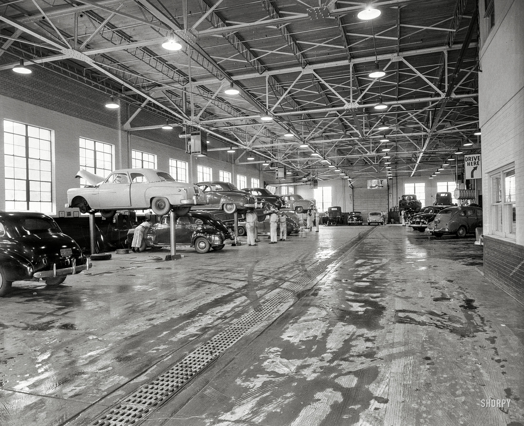 Columbus, Georgia. "John A. Pope Motor Co. garage, 1952." Service for your Mopar. 4x5 acetate negative from the News Archive. View full size.