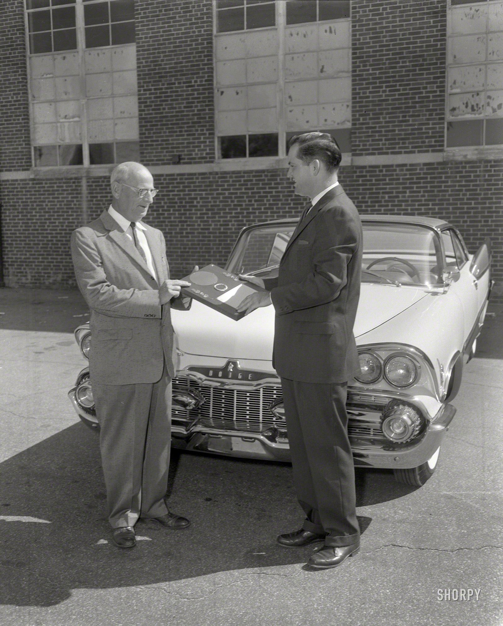 Columbus, Georgia, 1958. "Salesmen and 1959 Dodge." 4x5 acetate negative from the News Photo Archive. View full size.