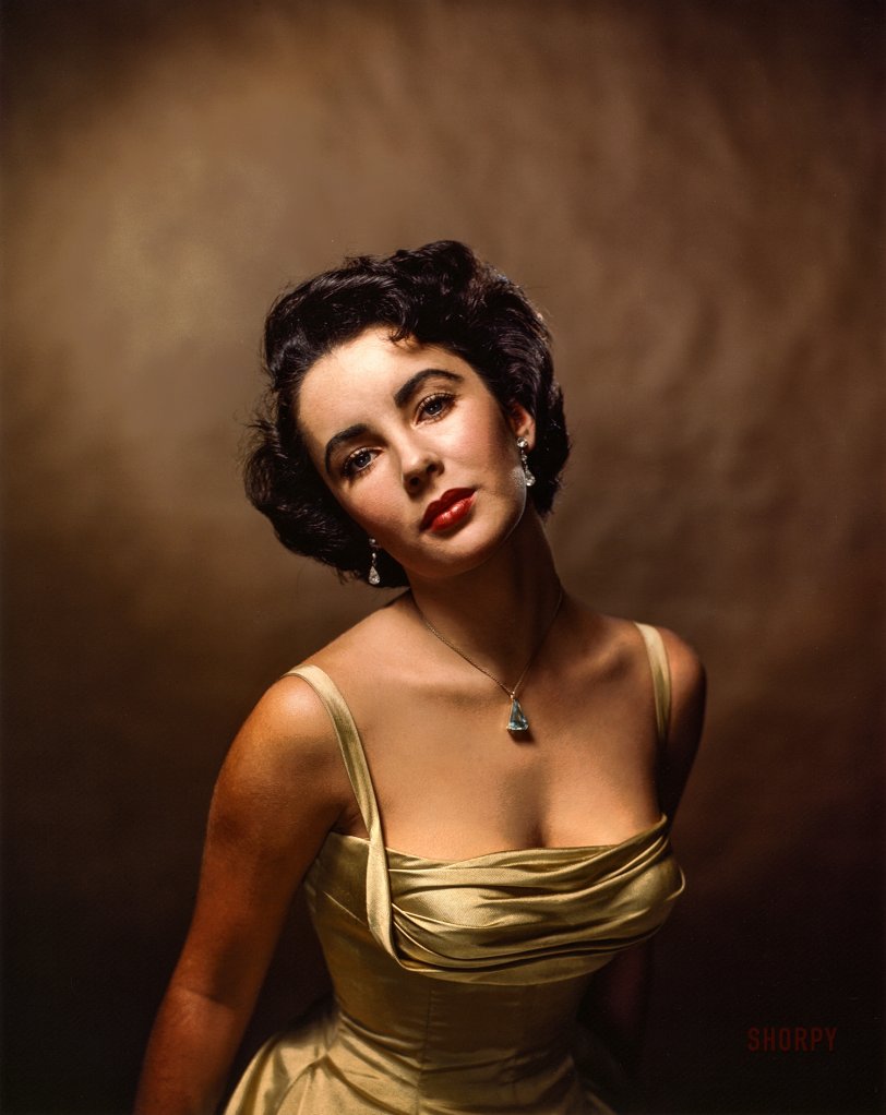 &nbsp; &nbsp; &nbsp; &nbsp; "In my studio Elizabeth was quiet and shy. She struck me as an average teenager, except that she was incredibly beautiful." -- Philippe Halsman

"In a décolleté silk evening dress Elizabeth Taylor sits for photographer Philippe Halsman. The former child star will be 17 next week." (Life magazine, February 21, 1949; photo taken in New York, October 1948.) Library of Congress Prints &amp; Photographs Division. View full size.
