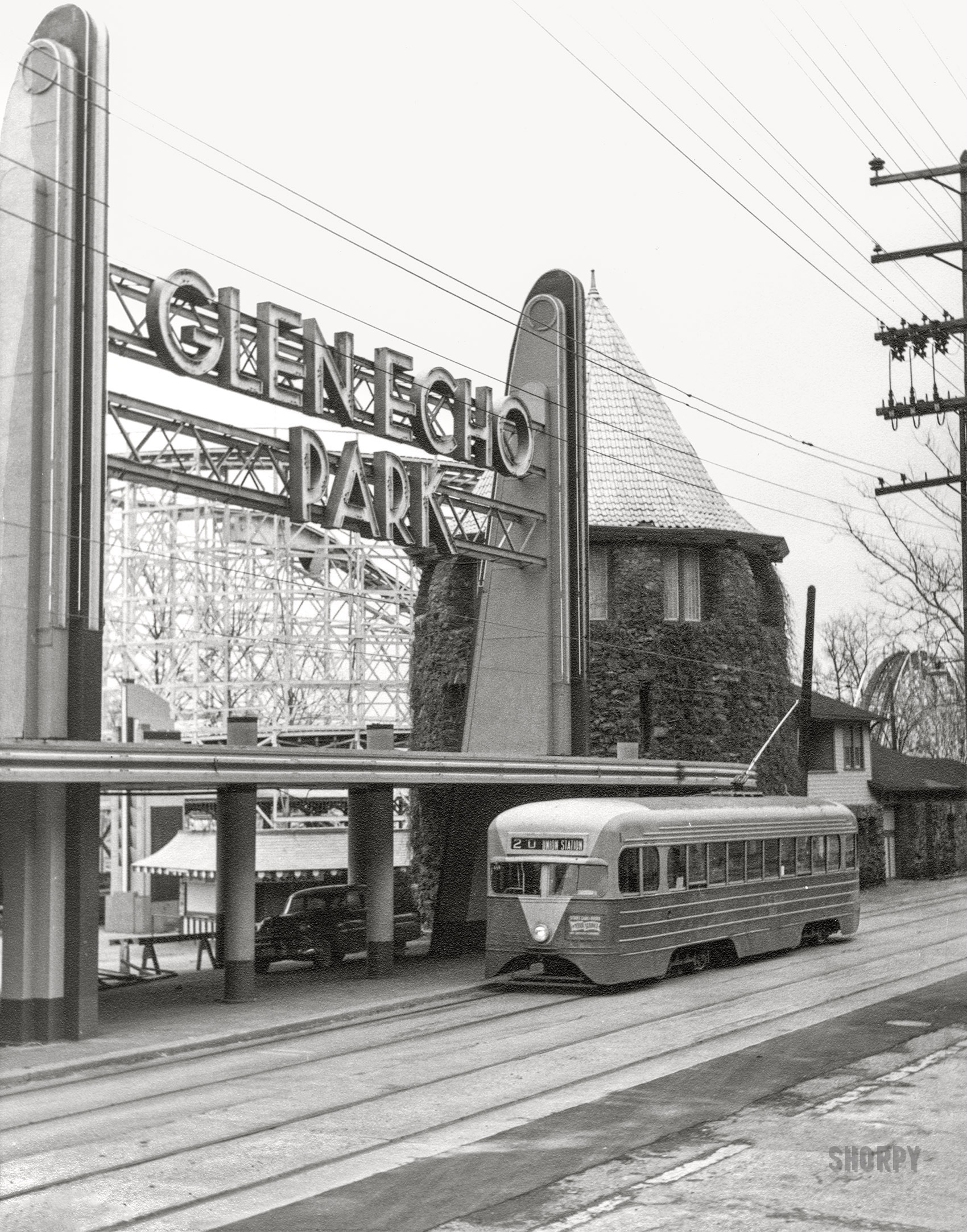 February 8, 1959. Montgomery County, Maryland. "Glen Echo Park entrance with trolley to Union Station in front." Gelatin silver print by Ara Mesrobian (1924-2019). View full size.
