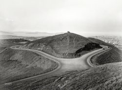 San Francisco circa 1925. "Auto at Twin Peaks -- North Peak seen from South Peak." 5x7 glass negative from the Wyland Stanley collection. View full size.
