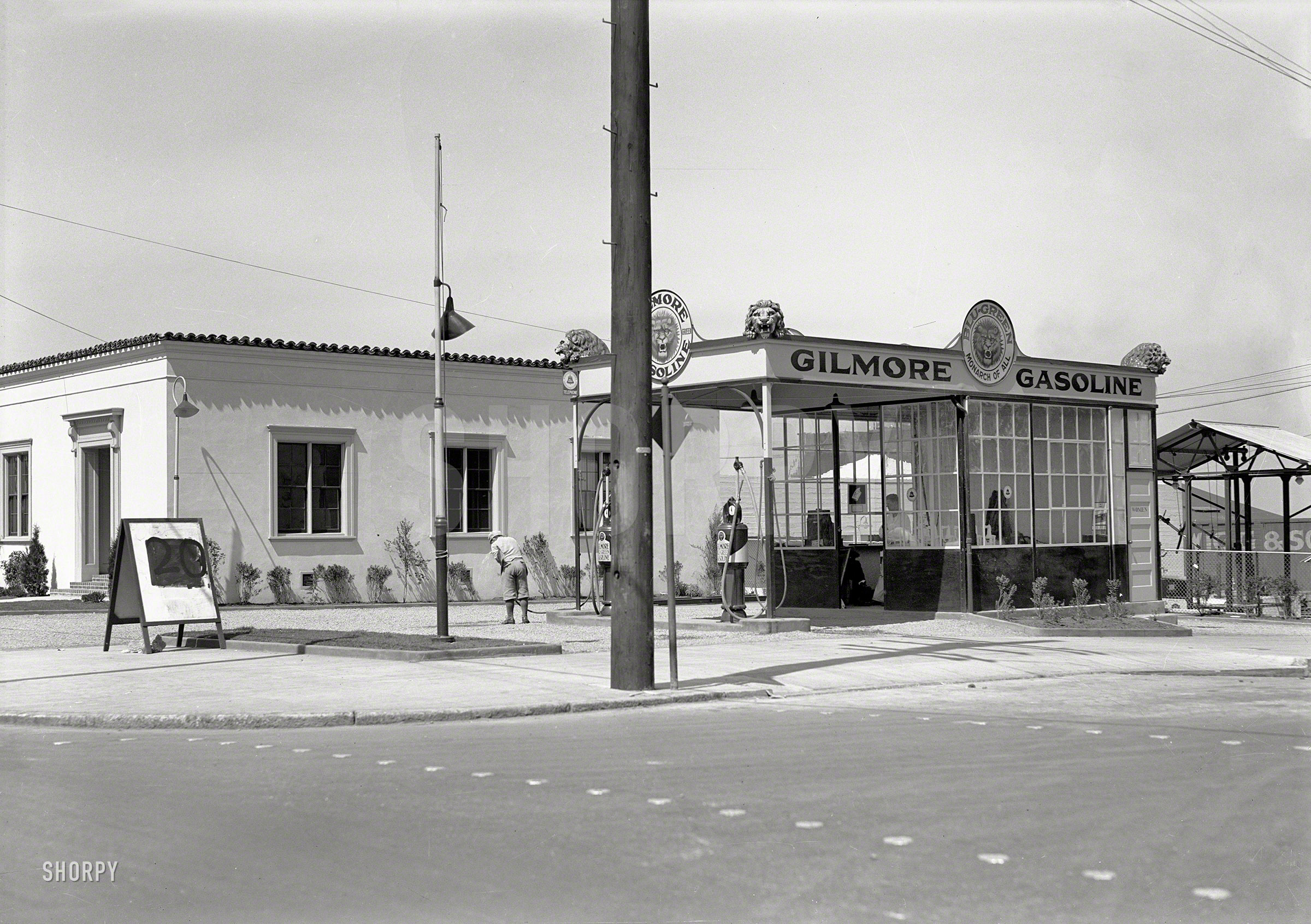 1920s San Francisco. "Gilmore Gasoline service station." Where you can fill up with gas or water. Who can tell us where this is? 5x7 glassneg. View full size.