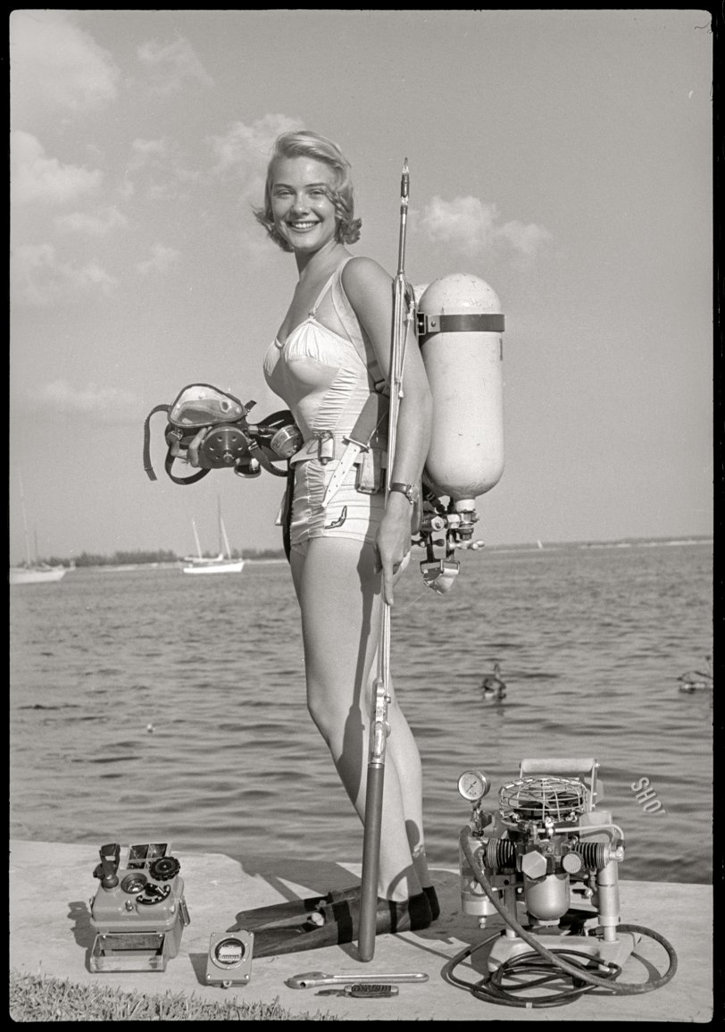 February 2, 1954. "Actress Hope Lange and diving instructor Chuck Diercksmeier diving off the Florida coast; Lange posed on seawall with an assortment of scuba equipment." 35mm negative from the Look magazine assignment "Everybody's Going Underwater." View full size.
