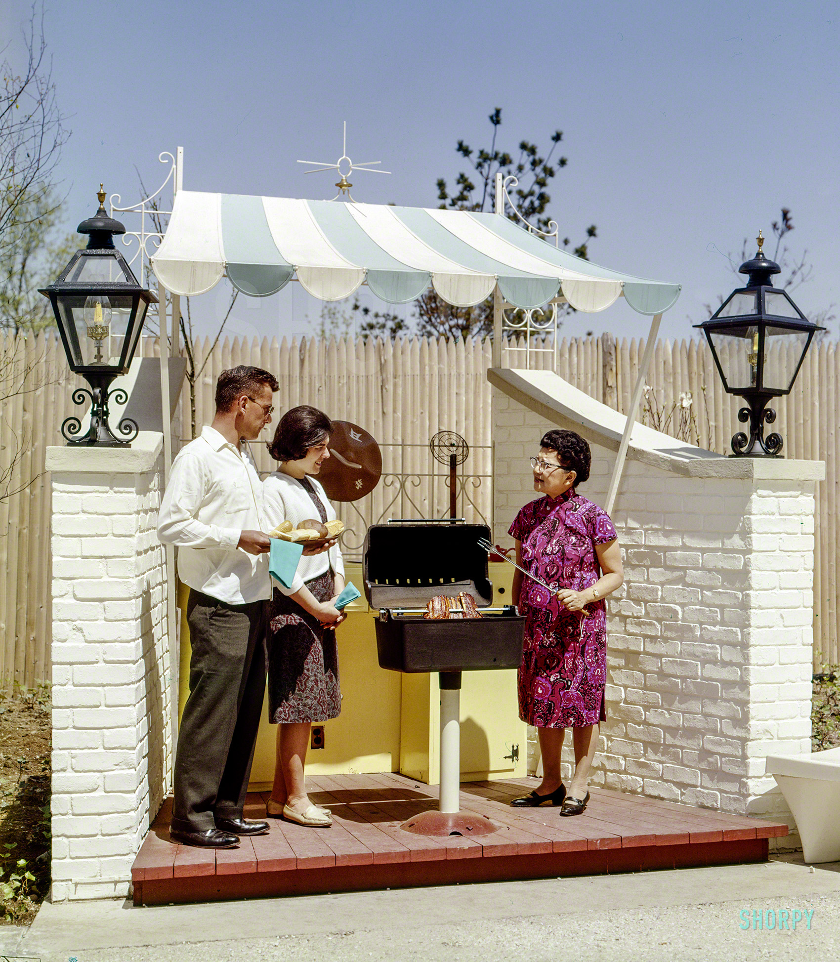 May 6, 1965. "World's Fair, Flushing, Long Island. Robert & Frances Vargo from Verplanck, N.Y., with Madame Grace Zia Chu, cooking Chinese Spare Ribs at Festival of Gas." Madame Grace, known as the "First Lady of Chopsticks," was a sort of Asian Julia Child who did her best to explain that authentic Chinese cuisine relied on fresh ingredients that did not come from a can. 4x5 inch Ektachrome transparency from the Shorpy Publicity Department archive. View full size.