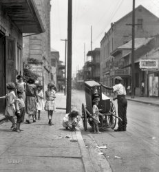 "Organ grinder, New Orleans, 1924." Nitrate negative by Arnold Genthe. View full size.
