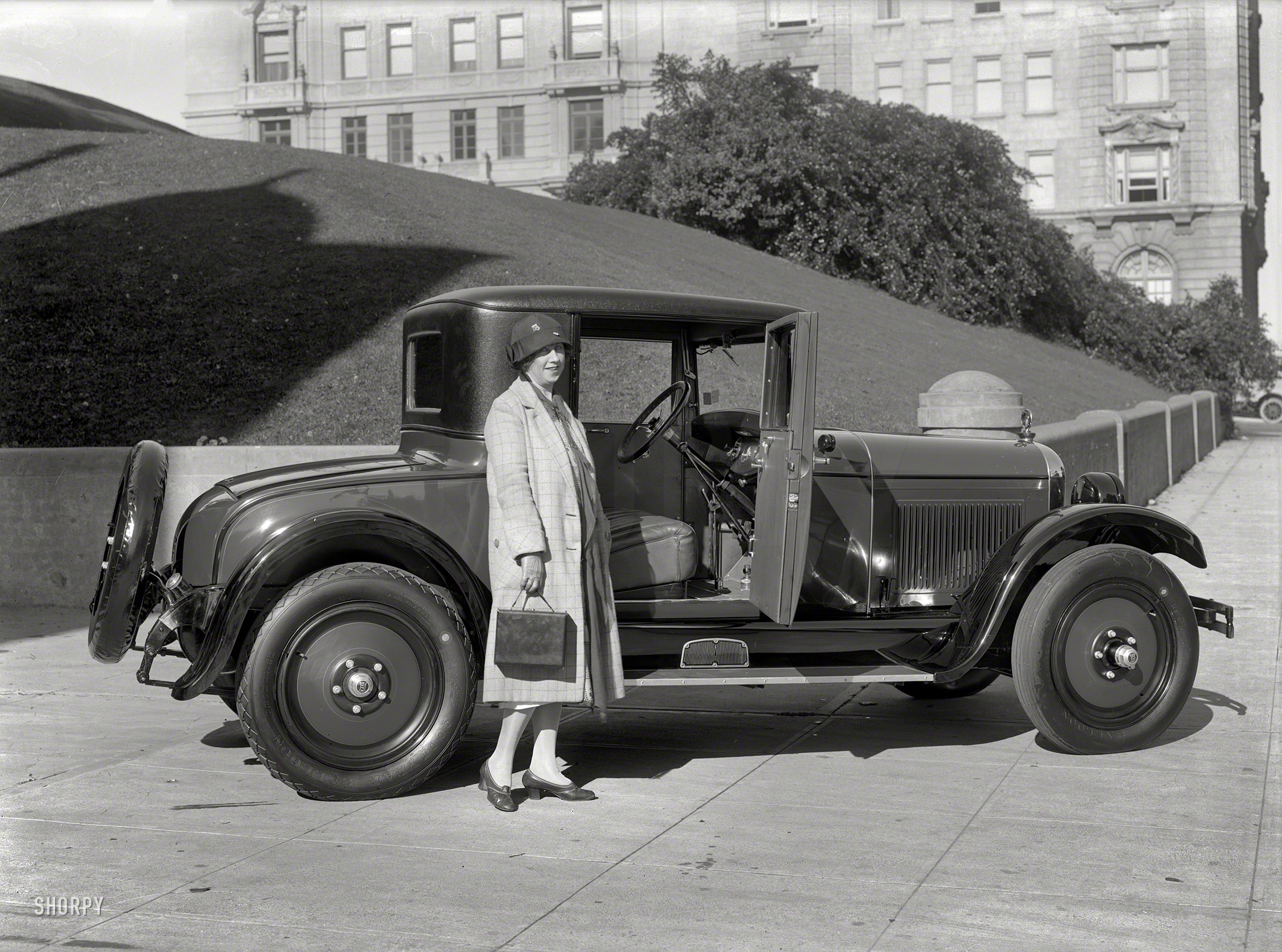 San Francisco circa 1928. "Nash Special Six on Gough Street at Lafayette Park." Sporting a brace of Goodyear 31 x 5.25 Balloons. And if you don't like my parking, get off the sidewalk.  5x7 glass negative by Christopher Helin. View full size.
