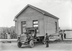 San Francisco circa 1919. "Truck moving house" ("Vista Grande"). Even for 1919, this rig looks ancient. Note the soapbox racer on skate wheels. 5x7 glass negative, formerly of the Wyland Stanley and Marilyn Blaisdell collections. View full size.