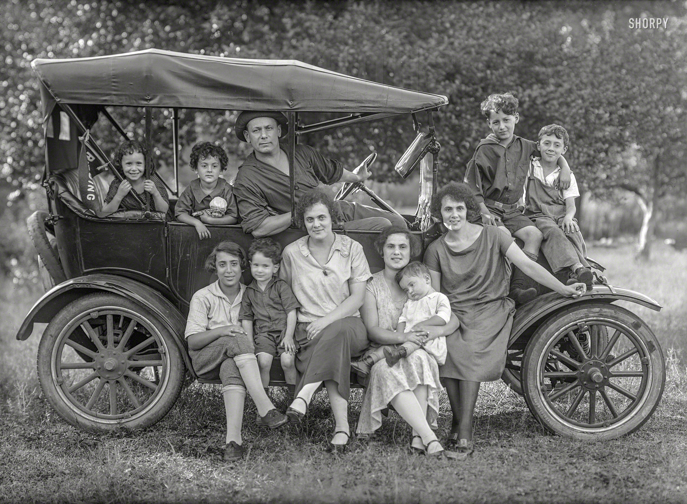 From somewhere in the Northeast circa 1920 comes this 5x7 glass negative, saved from the landfill thanks to an estate sale. Presumably these folks have moved on by now, having had what we hope was a pleasant journey. View full size.