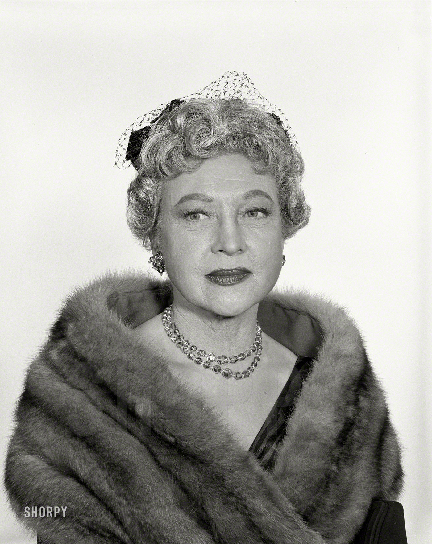 "Sexy actress Lurene Tuttle" is how the seller of this midcentury publicity still described its subject; "matronly character actor" might be more on the mark. For many years Lurene's voice was a fixture of the radio airwaves. 4x5 acetate negative from the Publicity Department Archive. View full size.