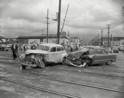 Fruitvale Avenue at 10th Street Street in Oakland circa 1956, and yet another vignette of vehicular violence. 4x5 inch acetate negative. View full size.