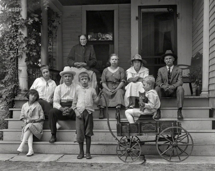 From ca. 1915 we bring you the John Doe family and their cat. 5x7 glass negative from that dusty box in Grandma's attic to an estate sale to you. View full size.

