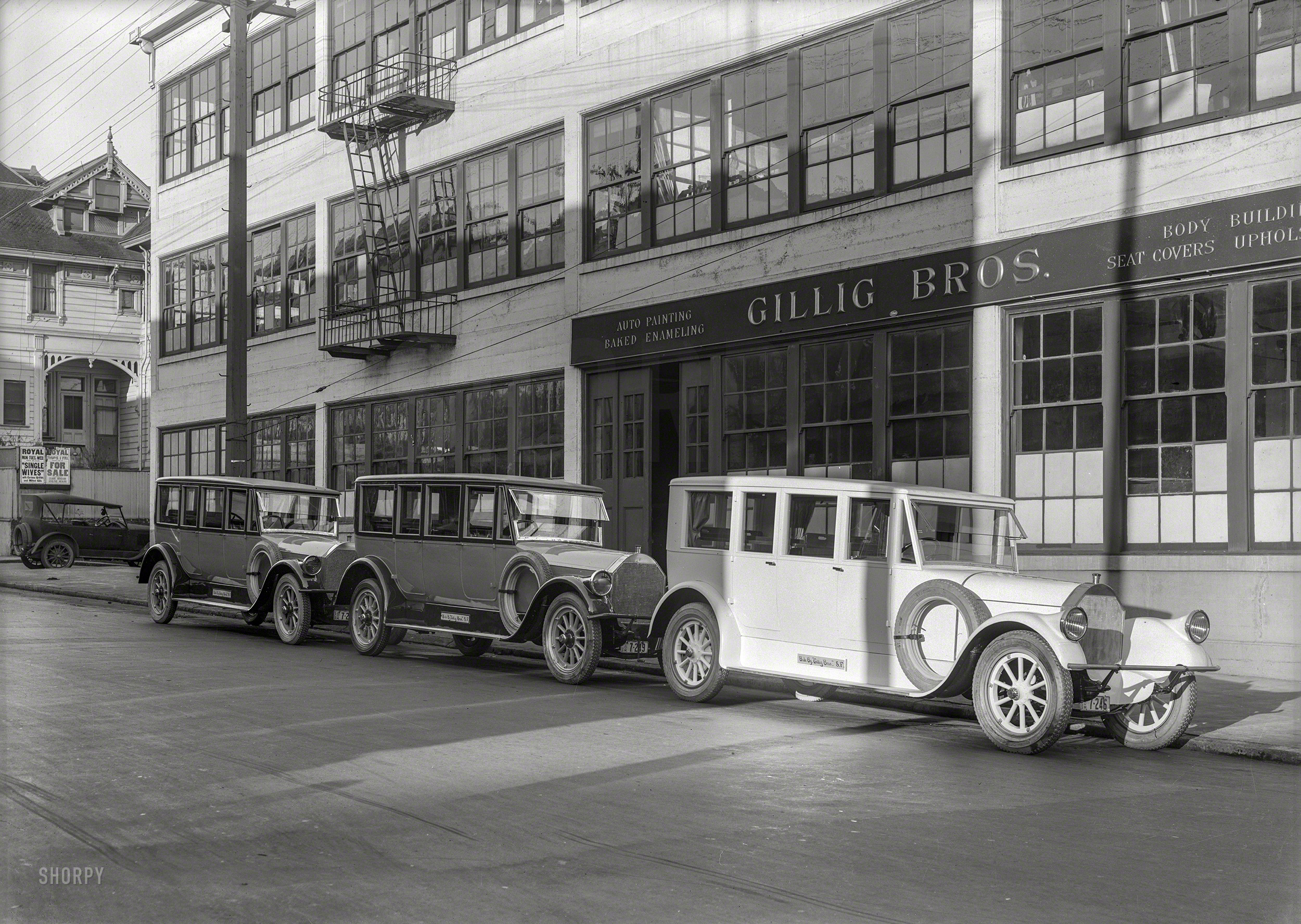 San Francisco, 1924. "Pierce-Arrow autos at Gillig Bros." Specialists in Body Building, Seat Covers, Auto Painting and Upholstery. Now playing at the Royal: "Single Wives." 5x7 glass negative by Christopher Helin. View full size.