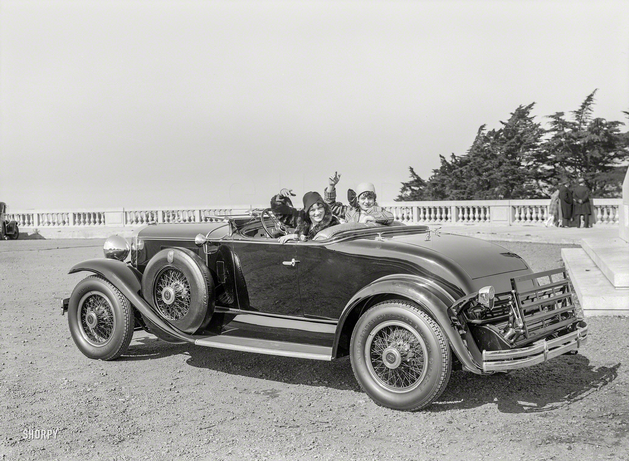 San Francisco circa 1929. "Graham-Paige at California Palace of the Legion of Honor, Lincoln Park." Which one is Paige, and which is Graham, we'll leave up to you. 5x7 glass negative by Christopher Helin. View full size.