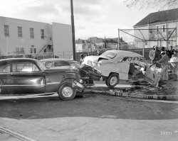 Circa 1955 Oakland and our latest motoring mashup: Ford tagged out by Pontiac. 4x5 inch acetate negative from the News Photo Archive. View full size.